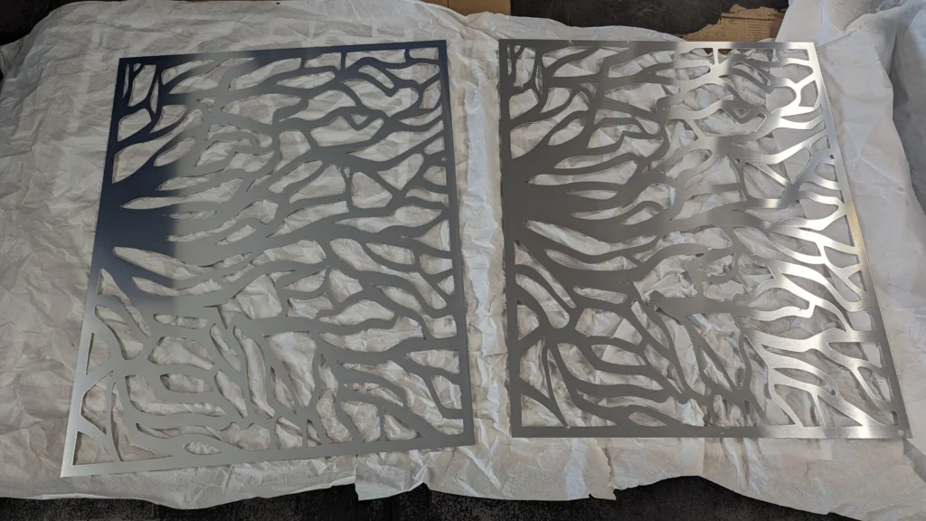 Aluminium lézervágott falidíszek fa mintázattal.
